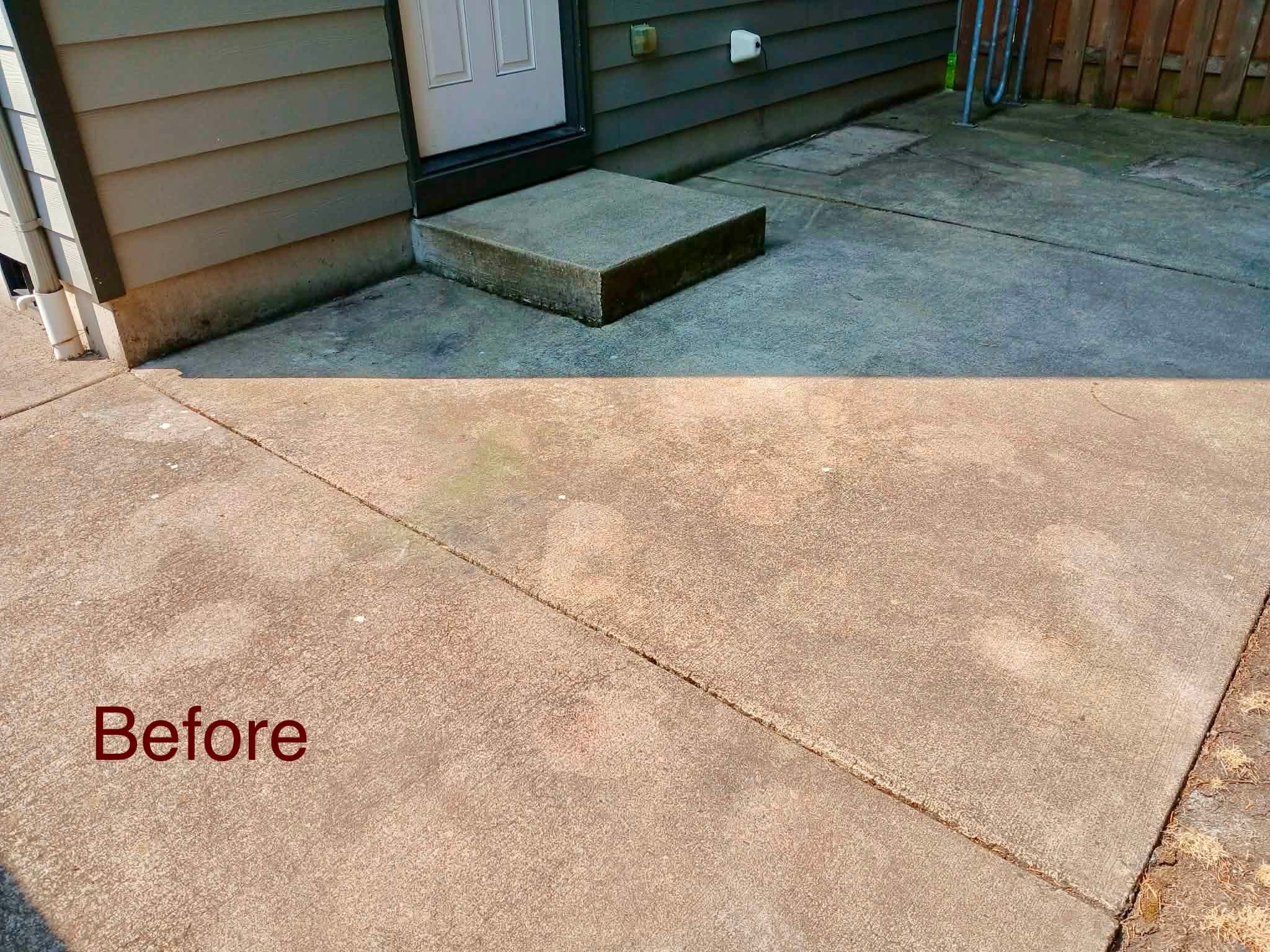 Dirty residential concrete walkway before pressure washing